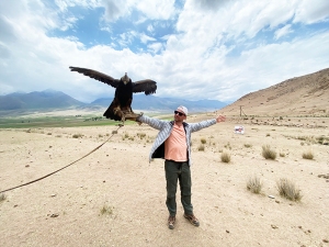 A man with an eagle on hunting in Kyrgyzstan